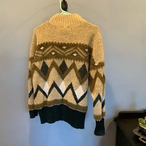 Warm pullover sweater with high neck